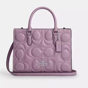 Maggie Small Tote Bag
In Signature Leather